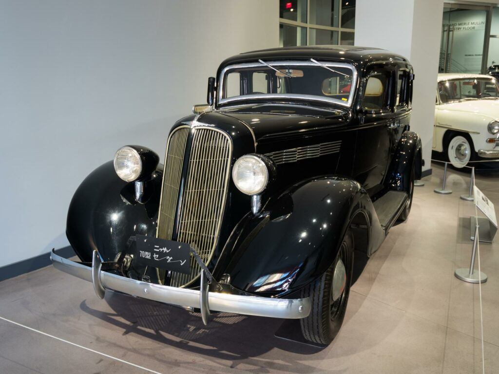 a black car parked in a car showroom - File:Petersen Automotive Museum PA140052 (45229770615).jpg
