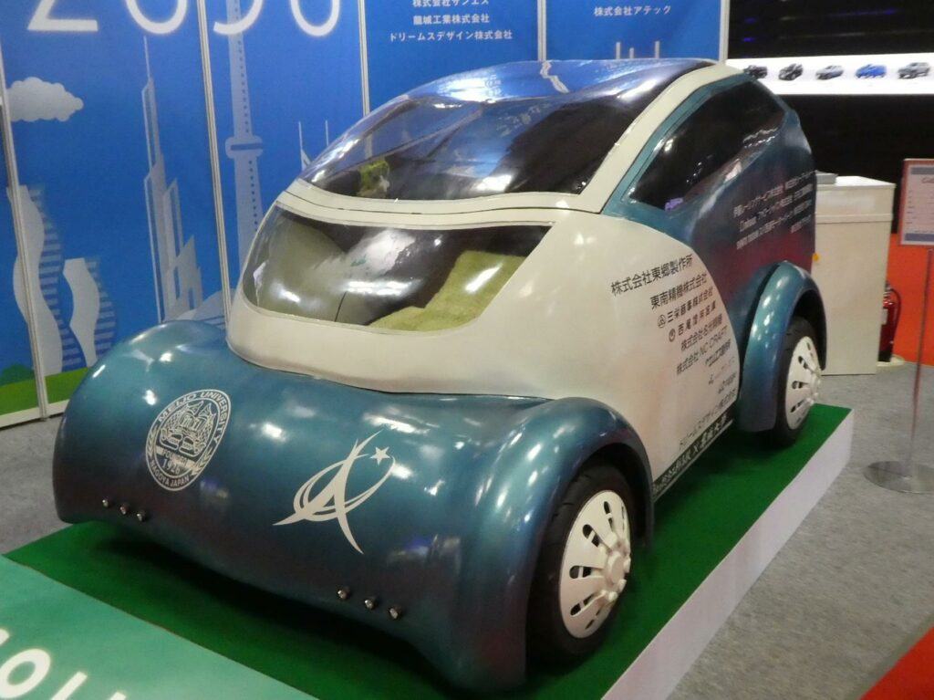 a small car with a small car shaped like a car - Folding Electric Vehicle 'COLLAPSE' (diagonally for